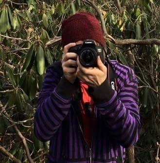 Mikey taking a photograph.