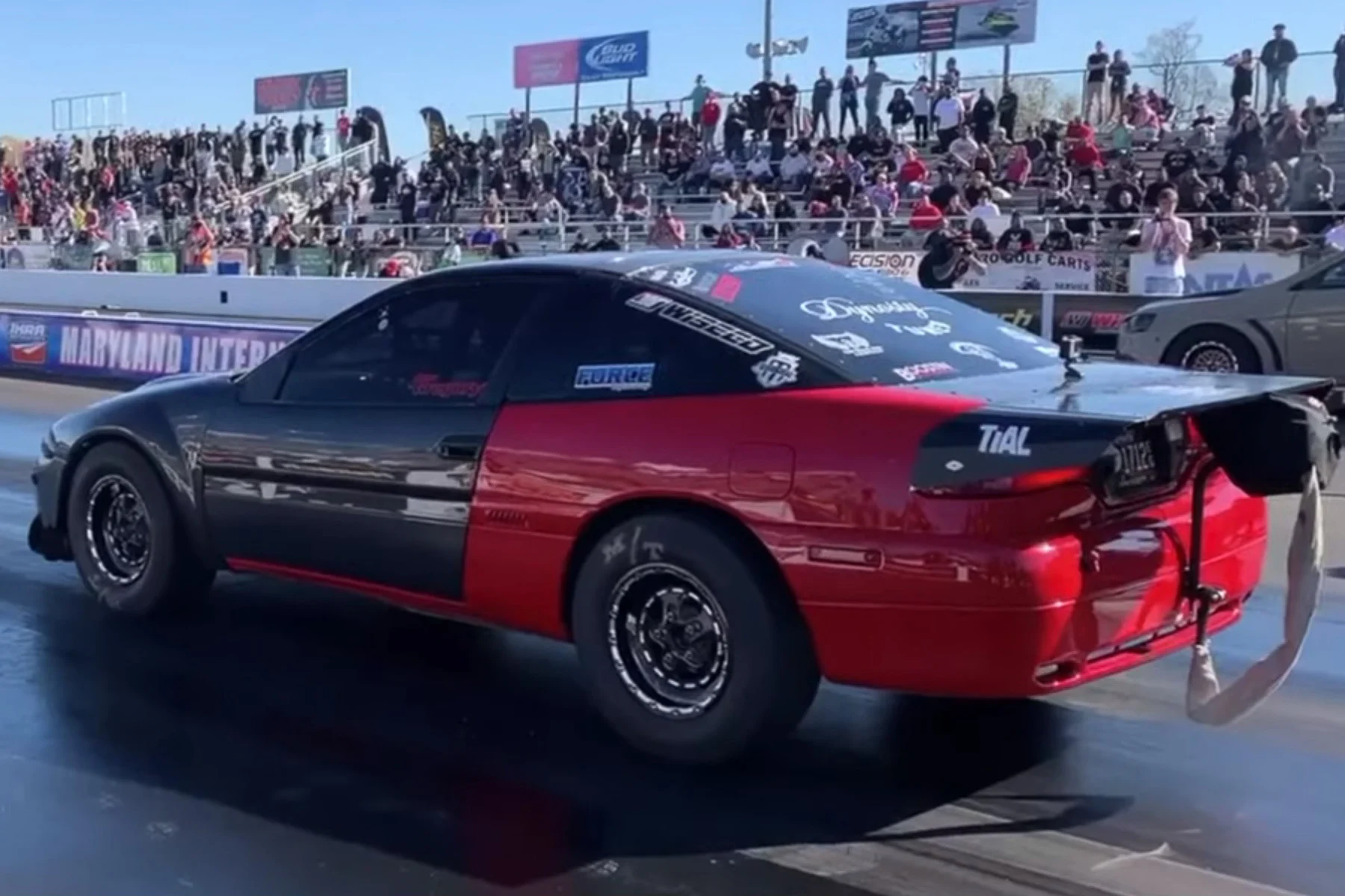 Racing Eagle Talon launching at drag strip